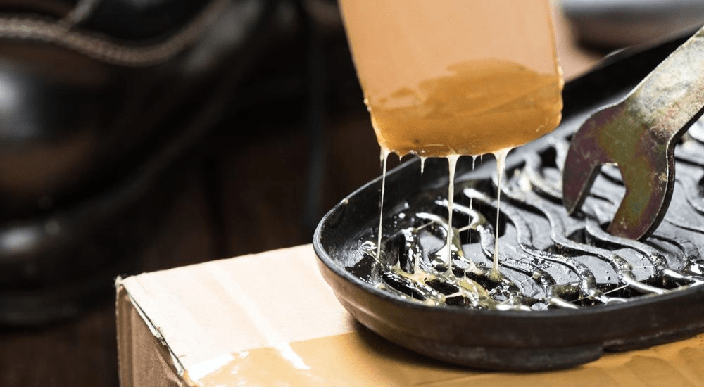 How do adhesives in shoe manufacturing affect durability?