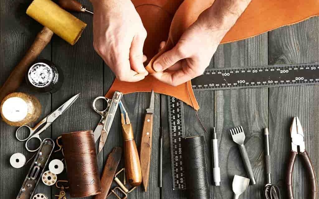 How is customization achieved in leather accessory production?