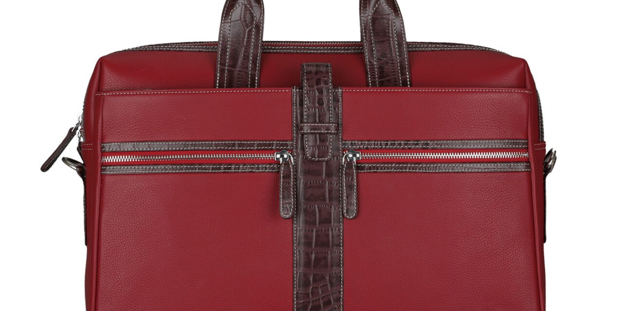 What design features are currently in demand for leather laptop bags and portfolios?