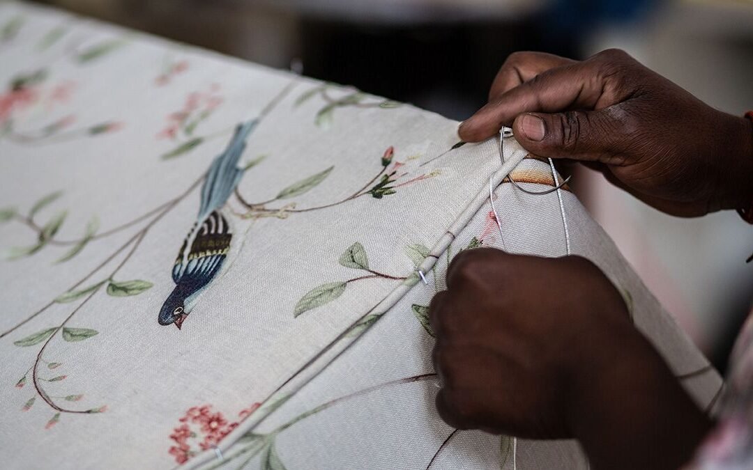 How do designers incorporate sustainability into leather garment designs?