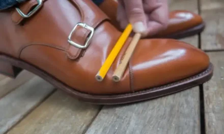 How can one prevent creasing in leather footwear?