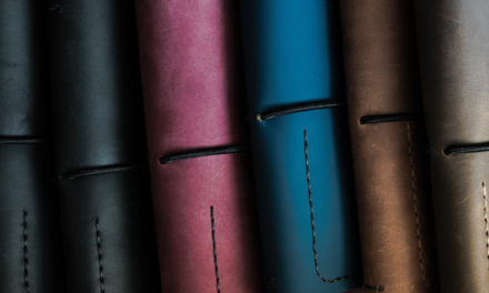How does the cost of raw leather influence the profitability of leather goods manufacturers?